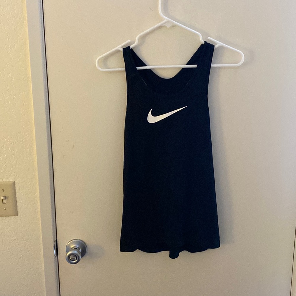 Nike brand size Small fry fit workout shirt. Form fitting.